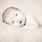 eyes wide open during custom newborn photography session by little rock photographer lizzy yates