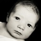 newborn boy with eyes wide open during little rock photo session