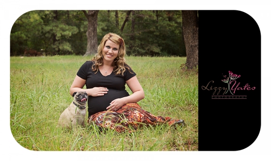 She smiles and hugs her pregnant belly as her best furry friend sits next to her near Little Rock Arkansas