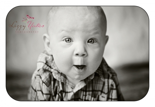 6 month old baby is so excited for his little rock photo session