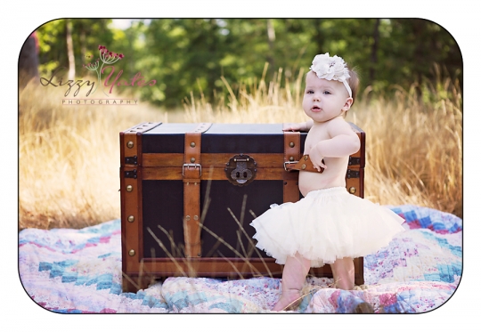Being a one year old girl is all about tutus and headbands Little Rock Child Photographer