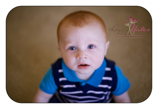 handsome 6 month old boy during photo session in little rock arkansas